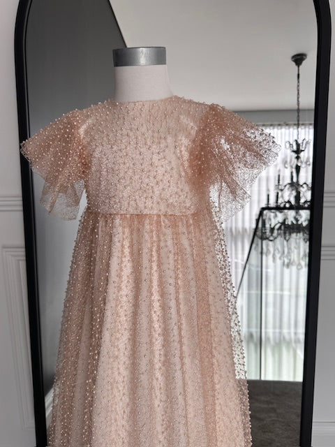 Close-up of pearl embellishment on Ivy Pearl christening gown